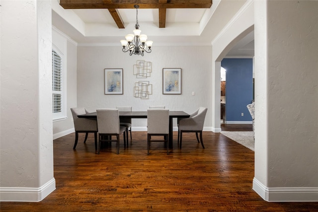 dining area with a textured wall, arched walkways, beam ceiling, wood finished floors, and a notable chandelier
