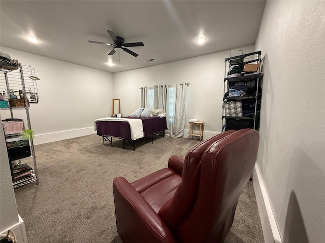 bedroom with baseboards, carpet, a ceiling fan, and visible vents