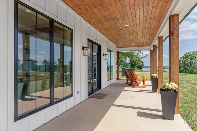 view of patio featuring a water view
