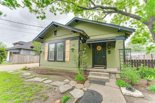 view of front of property with fence