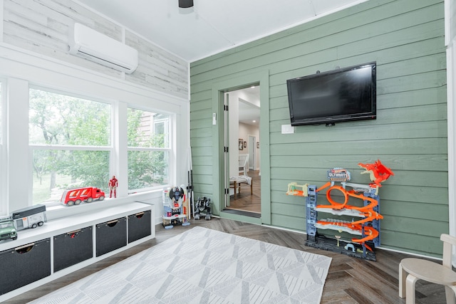 680 Alexandrite Dr, Oak Point, TX 75068 - bedroom with wooden walls and a wall mounted air conditioner