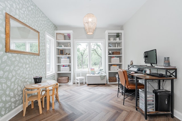 kitchen featuring appliances with stainless steel finishes, light countertops, a sink, open floor plan, and white cabinetry