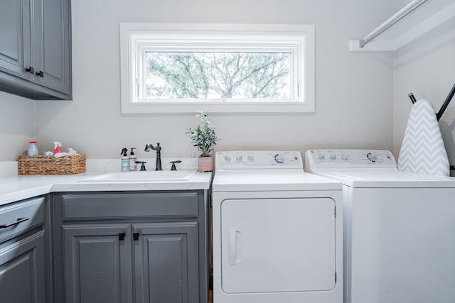 680 Alexandrite Dr, Oak Point, TX 75068 - laundry room featuring cabinet space and washing machine and clothes dryer