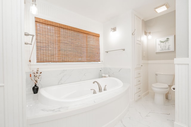 washroom with a sink, cabinet space, and washer and dryer