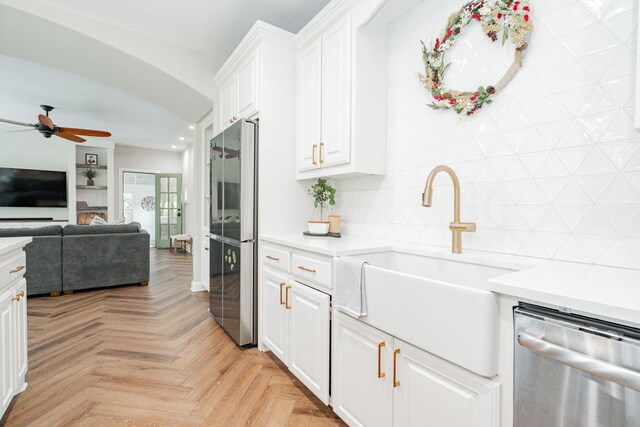 staircase featuring baseboards and recessed lighting