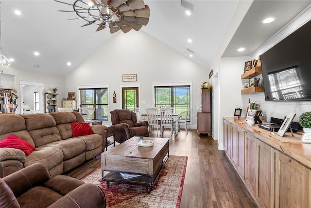 living area with recessed lighting, a ceiling fan, dark wood finished floors, and high vaulted ceiling