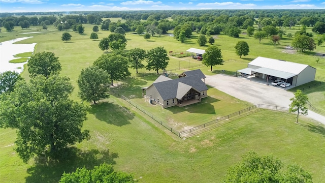 aerial view with a water view and a rural view