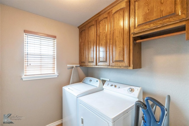 102 Wait Station Ave, Tuscola, TX 79562 - laundry room featuring washing machine and dryer, cabinet space, and baseboards