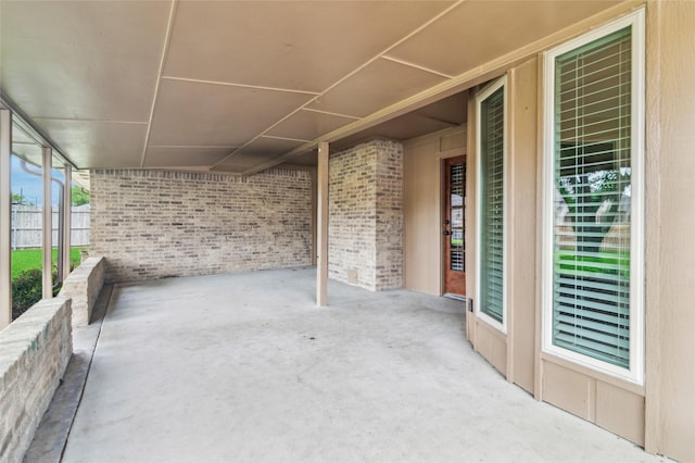view of patio / terrace featuring fence