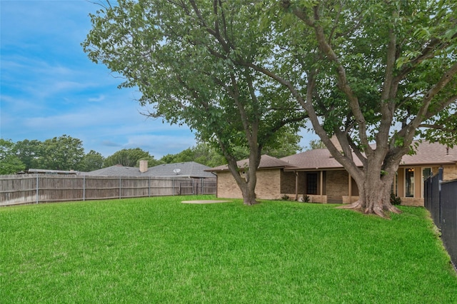 view of yard featuring a fenced backyard