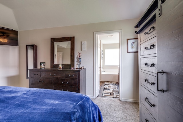 bedroom featuring baseboards, carpet, and ensuite bathroom