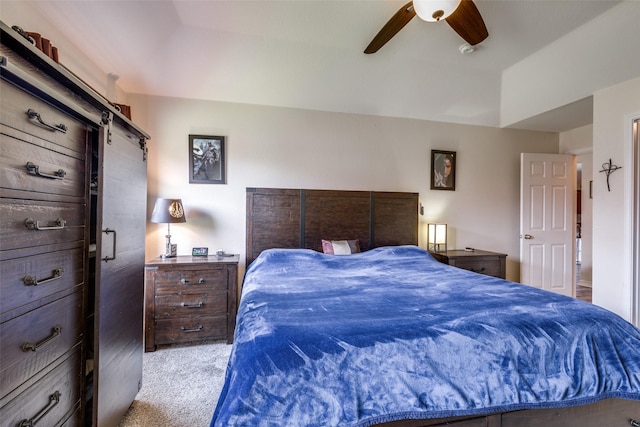 bedroom featuring ceiling fan and light carpet