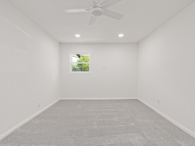spare room featuring baseboards, ceiling fan, carpet flooring, and recessed lighting