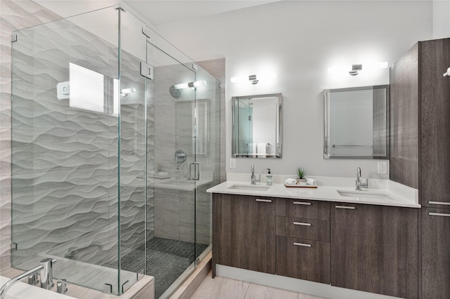 4935 Zuma Ct, Dallas, TX 75206 - full bathroom featuring double vanity, a stall shower, and tile patterned floors