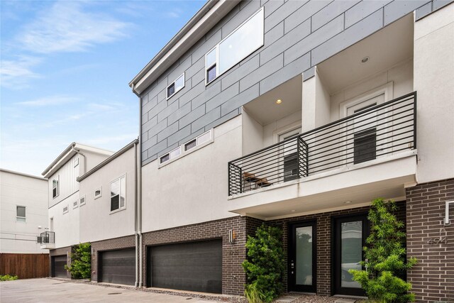 view of building exterior with a garage