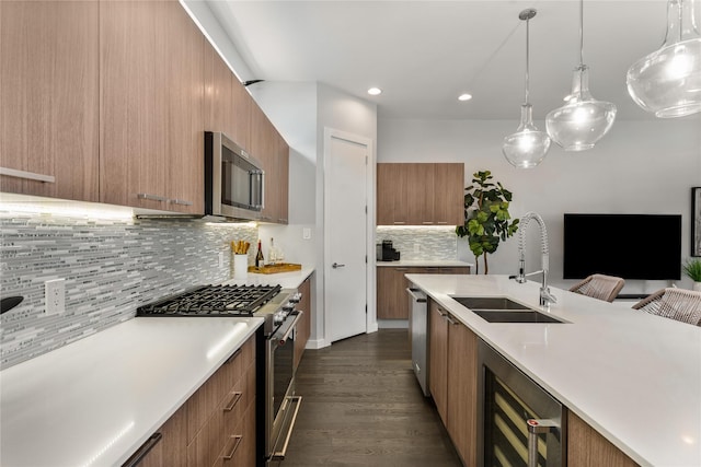 4935 Zuma Ct, Dallas, TX 75206 - kitchen with appliances with stainless steel finishes, modern cabinets, beverage cooler, a sink, and brown cabinets