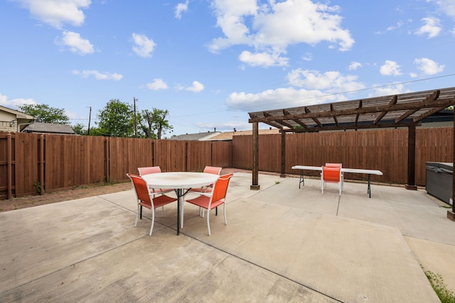 view of patio / terrace featuring a pergola, outdoor dining area, and a fenced backyard