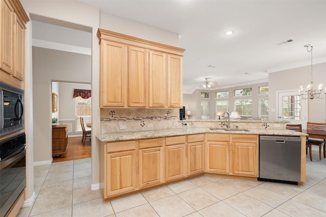 kitchen featuring crown molding, a sink, visible vents, and stainless steel appliances