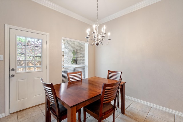 dining space featuring baseboards, ornamental molding, light tile patterned floors, and a chandelier
