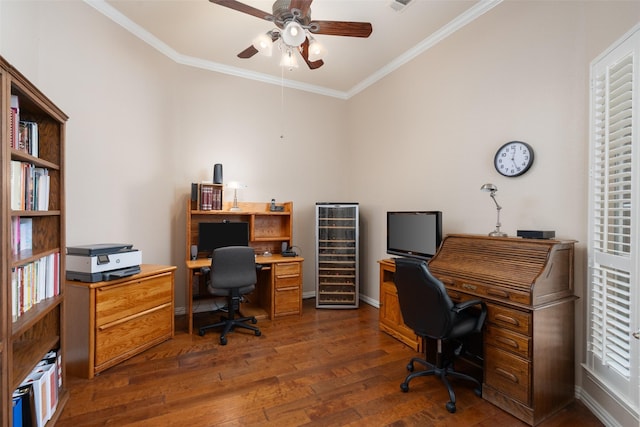 office area featuring ornamental molding, wine cooler, baseboards, ceiling fan, and dark wood-style floors