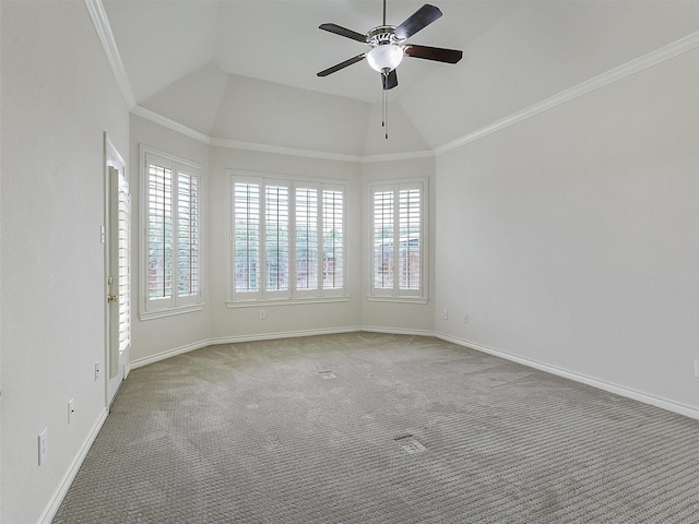 empty room featuring baseboards, a ceiling fan, carpet, and lofted ceiling