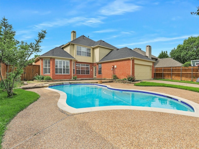 view of pool featuring fence and a fenced in pool