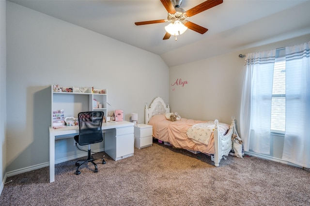 carpeted bedroom featuring a ceiling fan and vaulted ceiling