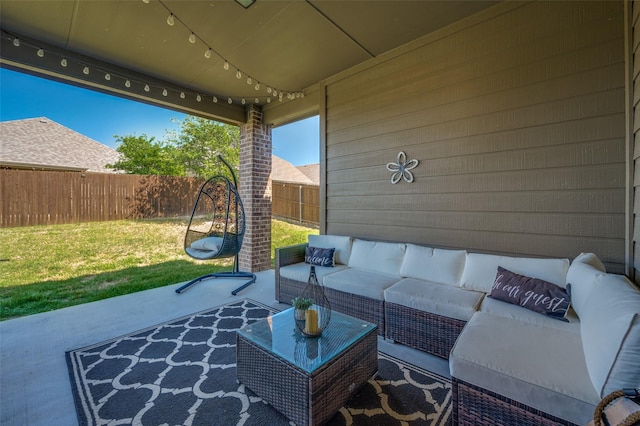 view of patio / terrace with a fenced backyard and an outdoor living space