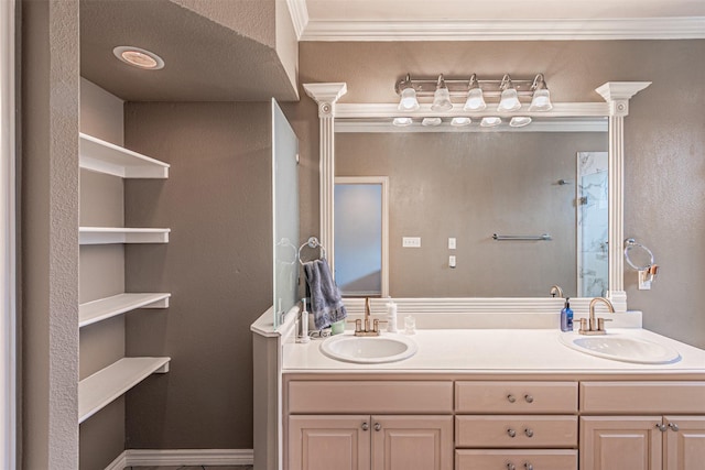 bathroom with double vanity, a sink, and ornamental molding