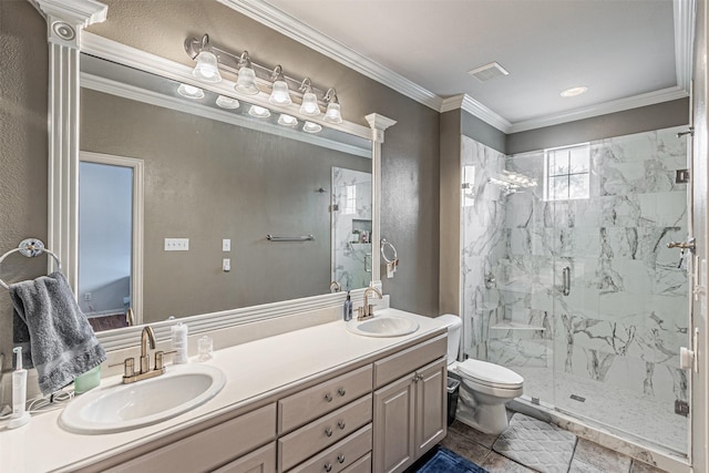 full bathroom with a sink, a marble finish shower, toilet, and visible vents