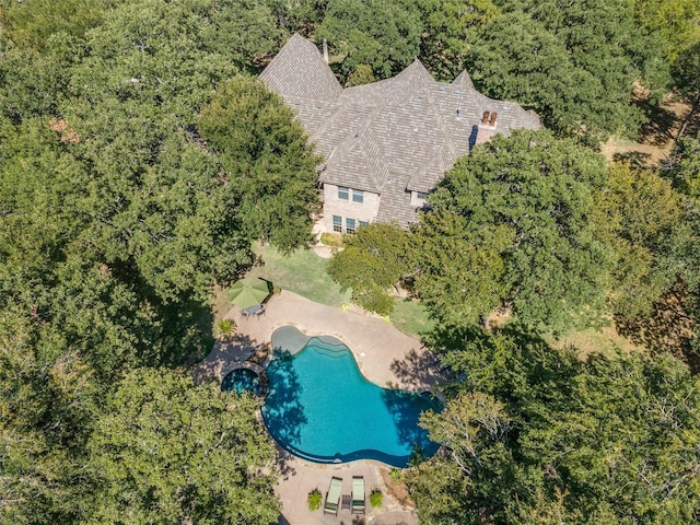 aerial view featuring a forest view