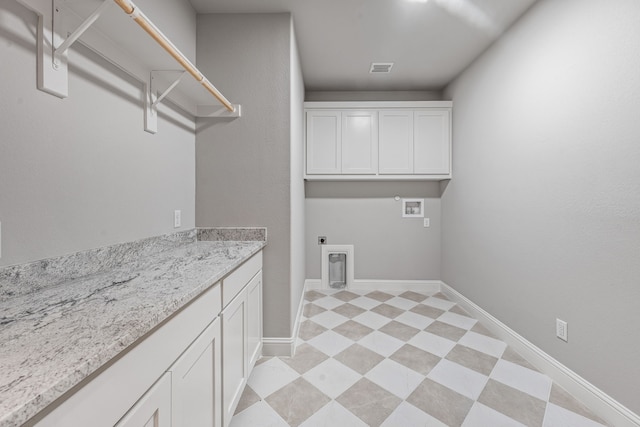 285 Lake Ridge Ct, Bluff Dale, TX 76433 - laundry room featuring cabinet space, hookup for a washing machine, hookup for an electric dryer, and baseboards