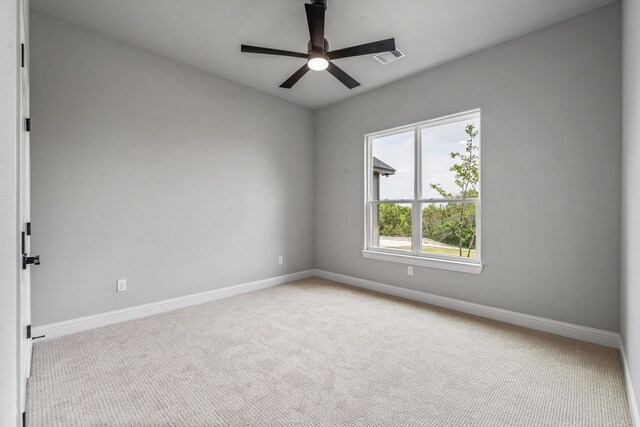 285 Lake Ridge Ct, Bluff Dale, TX 76433 - spare room featuring baseboards, carpet floors, and ceiling fan