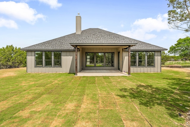 285 Lake Ridge Ct, Bluff Dale, TX 76433 - back of house with roof with shingles, a patio area, a lawn, and board and batten siding