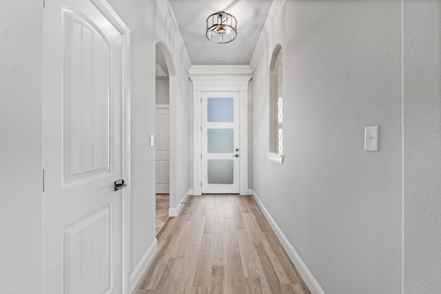 285 Lake Ridge Ct, Bluff Dale, TX 76433 - hallway featuring arched walkways, light wood finished floors, and baseboards