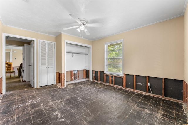 unfurnished bedroom with a ceiling fan, tile patterned floors, and ornamental molding