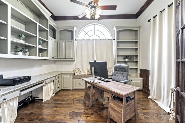 home office with crown molding, a wainscoted wall, ceiling fan, and dark wood finished floors