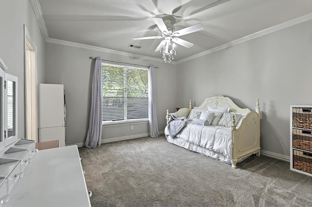 carpeted bedroom with baseboards, visible vents, ornamental molding, and ceiling fan