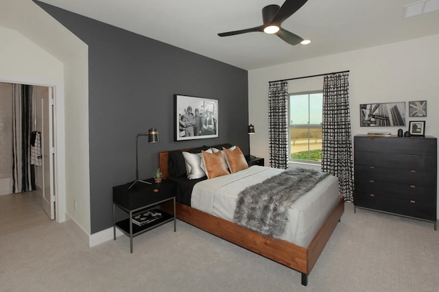 bedroom featuring carpet floors, baseboards, a ceiling fan, and visible vents
