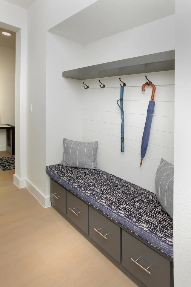 mudroom featuring baseboards