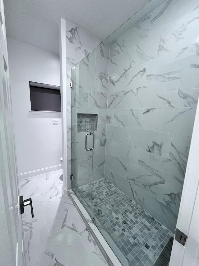 full bathroom with toilet, a shower stall, and marble finish floor