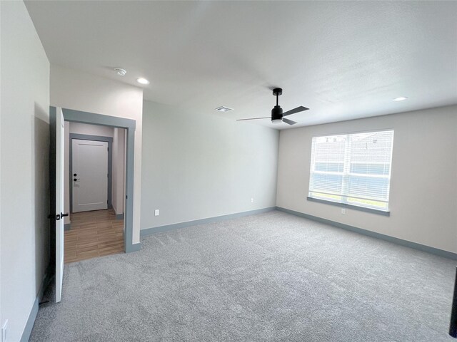 5008 San Marcos Dr, Granbury, TX 76048 - empty room featuring carpet flooring, a ceiling fan, baseboards, and recessed lighting