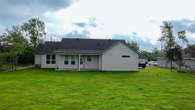 5008 San Marcos Dr, Granbury, TX 76048 - back of property featuring a yard and cooling unit