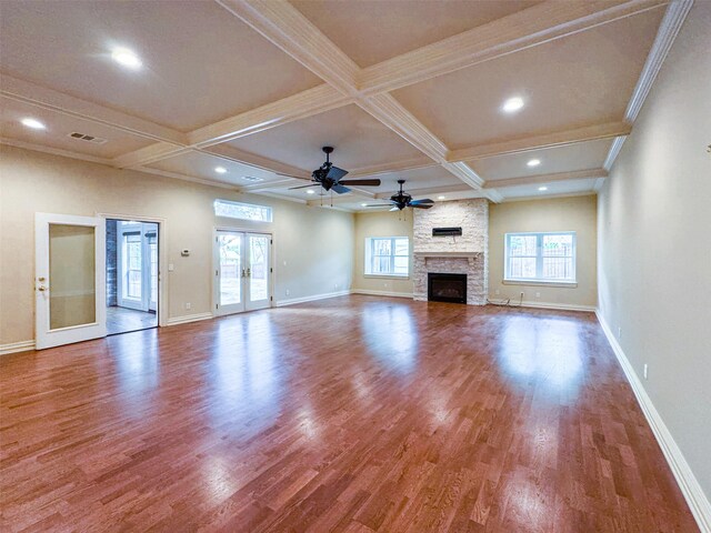 1520 Gatewood Dr, Denton, TX 76205 - unfurnished living room featuring wood finished floors, baseboards, a fireplace, a ceiling fan, and coffered ceiling