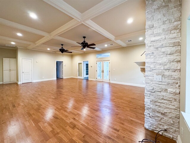1520 Gatewood Dr, Denton, TX 76205 - unfurnished living room with ceiling fan, light wood-style floors, beamed ceiling, baseboards, and coffered ceiling