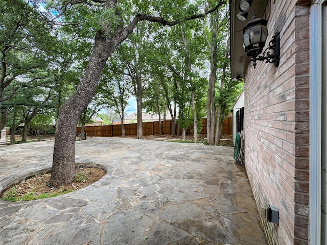 1520 Gatewood Dr, Denton, TX 76205 - view of patio featuring a fenced backyard
