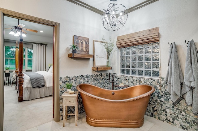 1320 Fox Ln, Burleson, TX 76028 - interior space with a soaking tub, carpet, ensuite bathroom, and ceiling fan with notable chandelier
