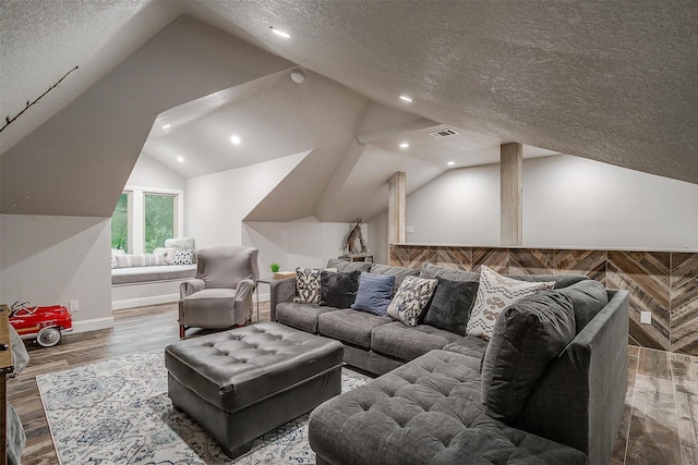 1320 Fox Ln, Burleson, TX 76028 - living room with recessed lighting, baseboards, wood finished floors, lofted ceiling, and visible vents