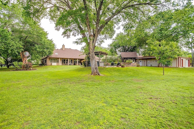 1320 Fox Ln, Burleson, TX 76028 - exterior space featuring board and batten siding, fence, an outdoor structure, and a garage