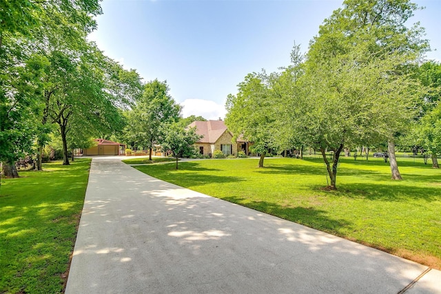 1320 Fox Ln, Burleson, TX 76028 - view of property's community featuring concrete driveway and a yard